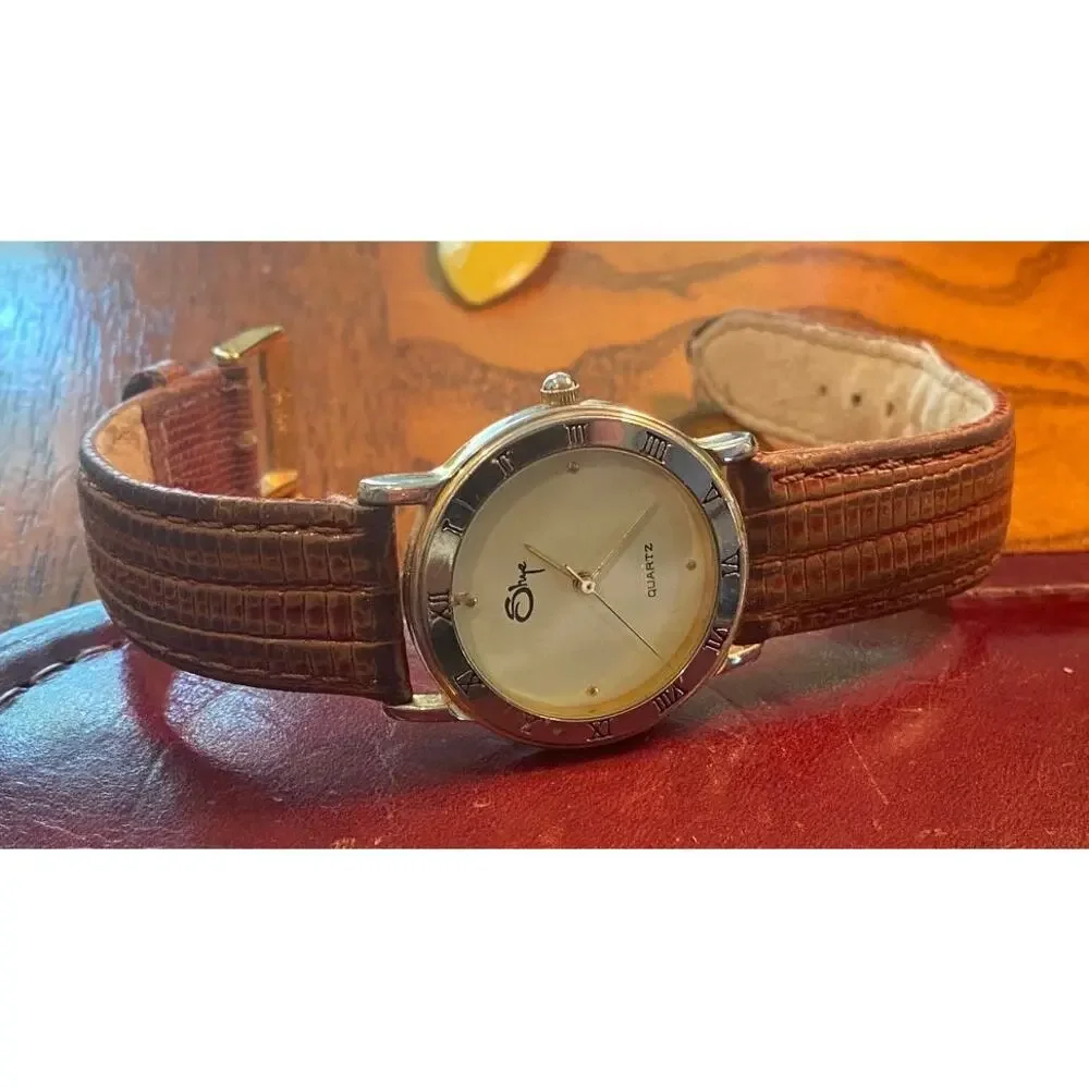 VTG women's Gold Tone Shye watch, Brown Leather Band
